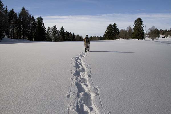 Schneeschuhwandern in den Bergen am Comer See